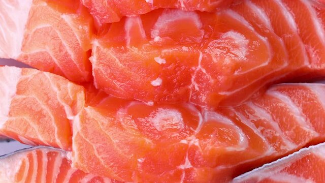 Close-up of slices of fresh raw red salmon