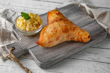Placinda pie stuffed with potatoes and onions. Rich pastries.