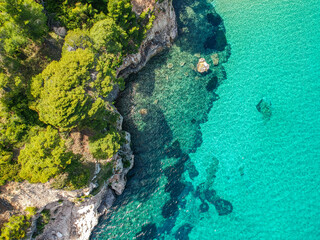 Aerial drone view over Chrisi Milia beach and the rocky surrounded area in Alonnisos island, Sporades, Greece