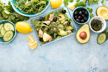 Tuna arugula salad prepared ahead and packed in a glass lunch box