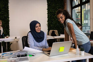 Group of of a young multiracial female businesswoman working in an office.