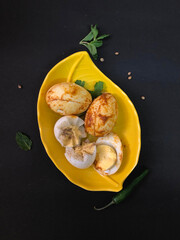 Spicy Egg  Fried masala with black background
