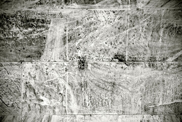 Obraz premium Stone wall layer background in black and white. Rough wall texture.