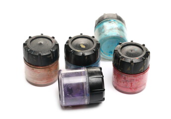 Colorful bottles, containers with printer color, paint isolated on white background