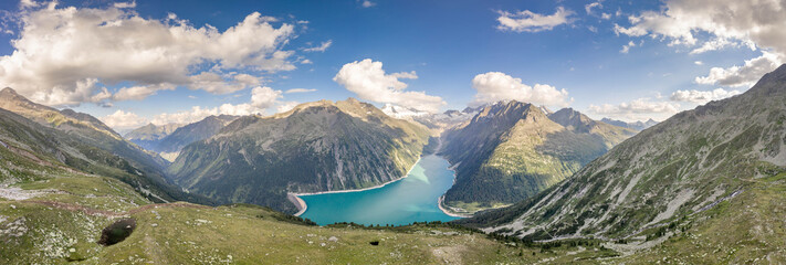 Aerial panoramic shot of Schlegeisspeicher glacier reservoir in zillertal alps in Austria