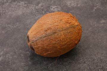 Tropical brown coconut over background
