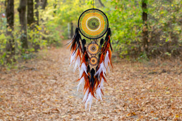 Handmade dream catcher with feathers threads and beads rope hanging