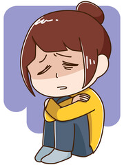 膝を抱えて考え込む女性