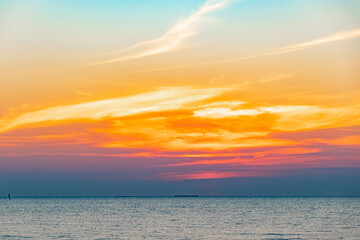 Tropical Colorful sunset over ocean on the beach. at Thailand Tourism background with sea beach. Holiday journey destination