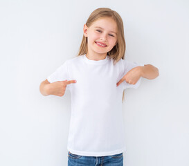 Funny looking girl in white blank t-shirt, pointing at herself, with copy space