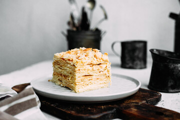 Napoleon cake in a plate on the table