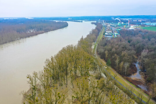 Drone photography of the flooded floodplains of the german Rhine River near Wörth, Maxau. Flood disaster in winter.