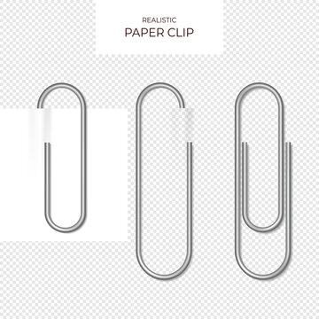 Metal paper clips on transparent background isolated and attached to paper