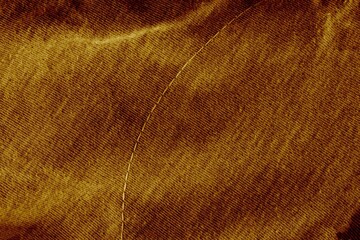 Brown cotton texture. Crumpled cotton texture