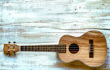 ukulele on aged background, vintage style image