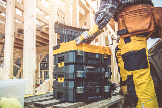 Construction Worker Preparing His Toolboxes