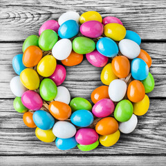 Fototapeta na wymiar Easter eggs decoration against wooden background