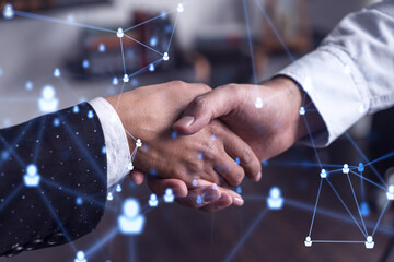 Recruitment concept of hiring of a new talented specialists for international company. Handshake as a concept of agreement to sign an employment contract. Social media hologram icons.