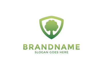 Tree and Shield logo design.Vector tree logo.