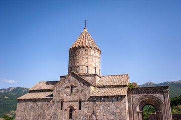 Fototapeta na wymiar Tatev, Armenia - July 6, 2018: The Cathedral of Saints Paul and Peter of Tatev monastery in Armenia
