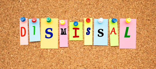 Color notes with letters pinned on a board. Word DISMISSAL.