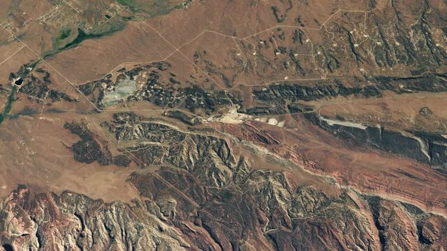 The Utah desert viewed from space from a satellite. Contains public domain image by NASA.