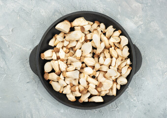 Eringi mushrooms in frying pan