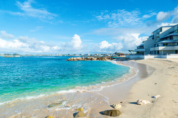 The caribbean island of St.Maarten landscape and Citiscape. Pelican beach  located in the Caribbean...