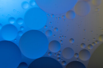macro oil water photography Abstract background and texture of bubbles light multi color illumination.  art water surface for your products display and artwork design with copy space. Watery glare 