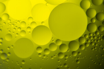 macro oil water photography Abstract background and texture of bubbles light multi color illumination.  art water surface for your products display and artwork design with copy space. Watery glare 