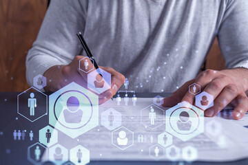 A potential employee signing the contract to boost his career and gain new opportunities in personal growth. Concept of success. Hiring a new talented crew. Social media hologram icons