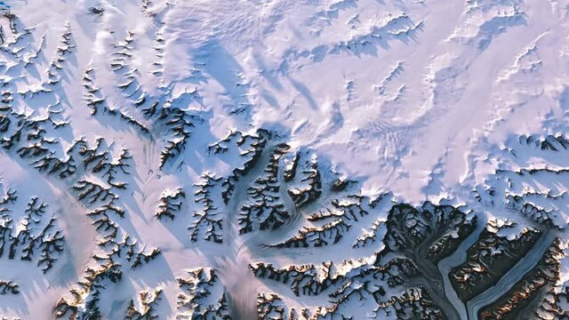 Greenland country with ice and snow viewed from space. Contains public domain image by NASA.