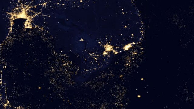 The south east Asian countries at night viewed from space from a satellite. Contains public domain image by NASA.