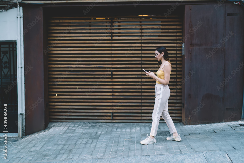 Poster millennial blogger typing text for sharing content publication in social networks using smartphone d