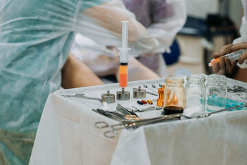Operation for liposuction, lipofilling, surgery in cosmetology - fat and stem cell transplantation.