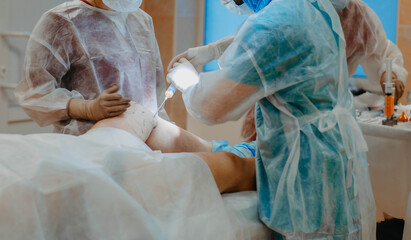 Operation for liposuction, lipofilling, surgery in cosmetology - fat and stem cell transplantation.