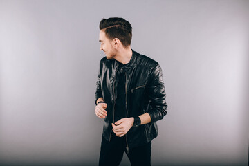 Portrait of a young man wearing a leather jacket