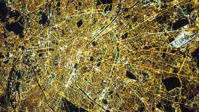 Paris city France view from space during night time from a satellite. Contains public domain image by NASA.