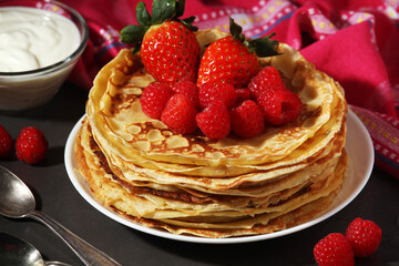 Russian cuisine national dish bliny with fresh berries