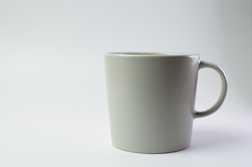 Coffee mug cup with light and shadow modern style on single position and presentation white background, empty tea cup isolated wallpaper.