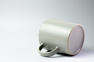 Coffee mug cup with light and shadow modern style on single position and presentation white background, empty tea cup isolated wallpaper.