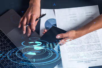 Woman hands typing the keyboard to create innovative software to change the world and provide a completely new service. Close up shot. Hologram tech graphs. Concept of Dev team. Casual wear.