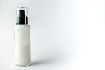 Beauty cosmetic white color on white background isolated, face care cream, dropper, brush on for healthy make up. Product container design bottles. Skin care products on empty background
