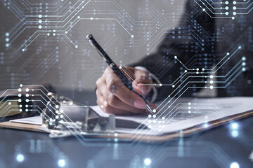 African American businesswoman is signing a contract to create a new software to present it in...