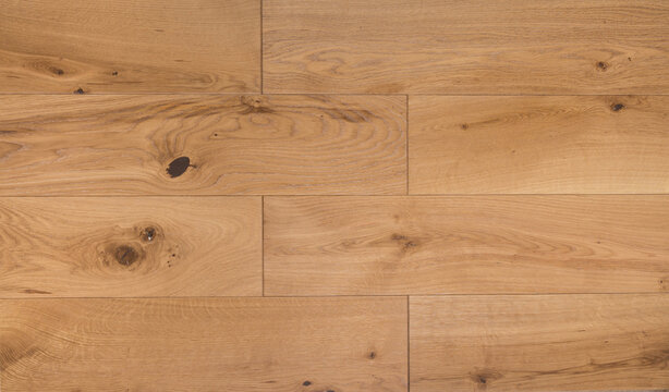 Light brown wooden parquet panels texture background