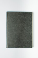 Black book hard cover on white background color isolated
