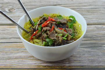 Beef soup with mee hoon or rice vermicelli or bee hoon with soy sauce.Basically called as Bihun Sup...