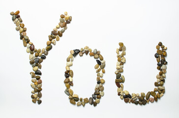 Love pebbles stone on white background isolated concern love and Valentine's day concept in February