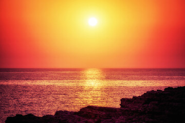 Colorful sunset over sea at Malta