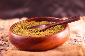 The whole mug or moong is kept on top in a wooden bowl,maash or moong bean heap in wooden bowl,Short HD Quality Video moong or Mung